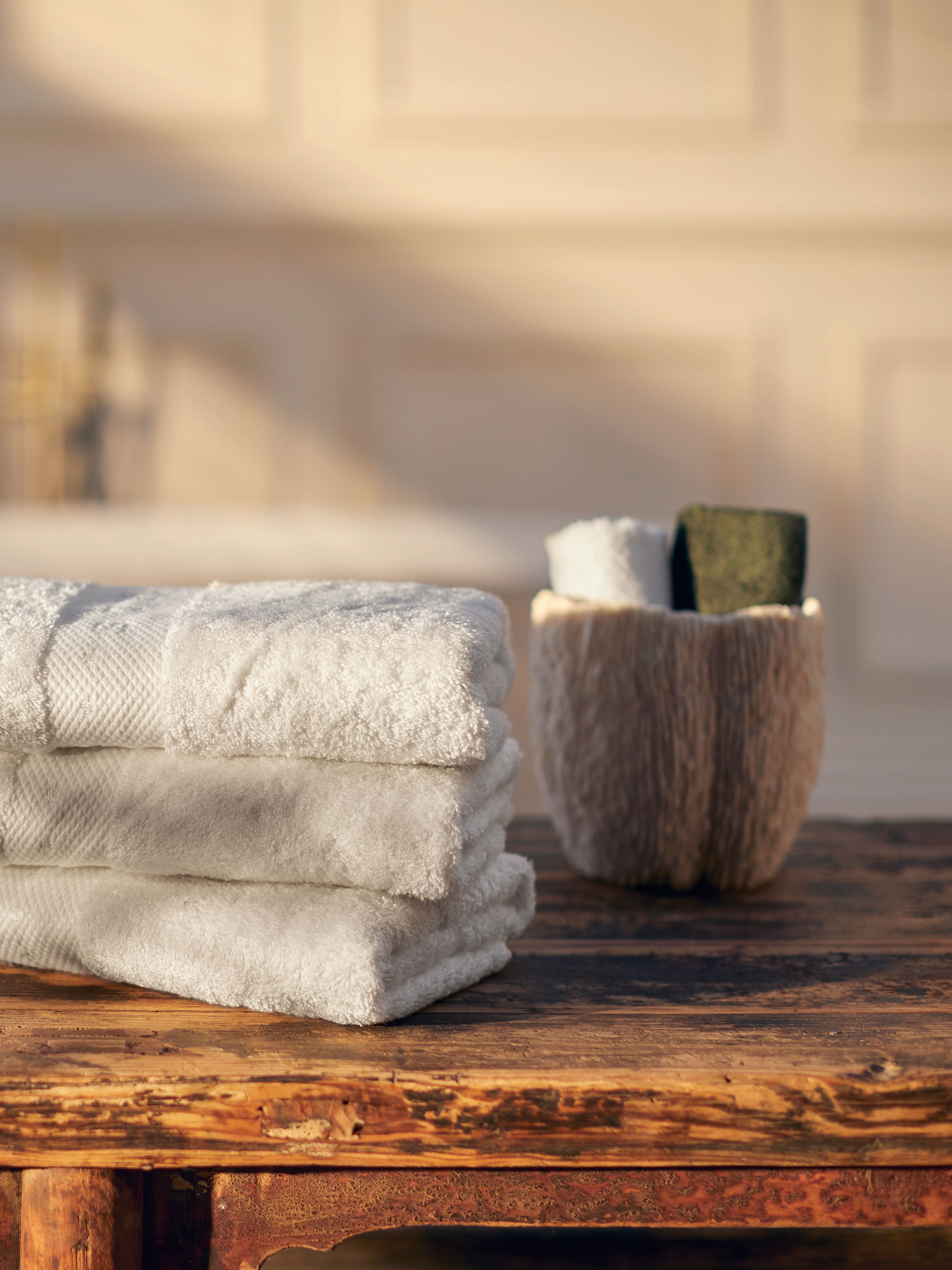 Super Smooth Cotton Hand Towel 50x100cm Off White Lifestyle with Product