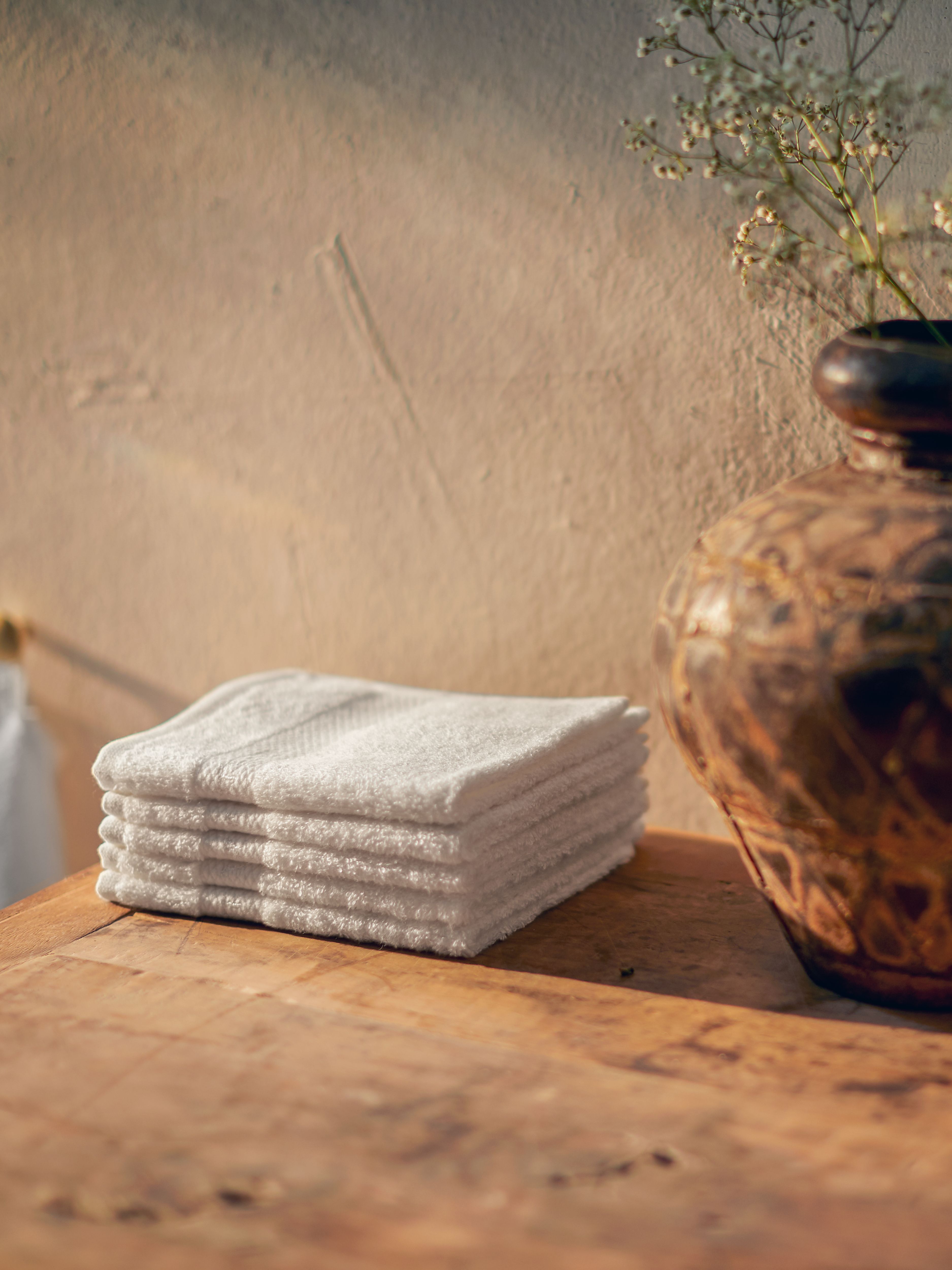 Super Smooth Cotton Guest Towel 30x30cm Off White Lifestyle with Product