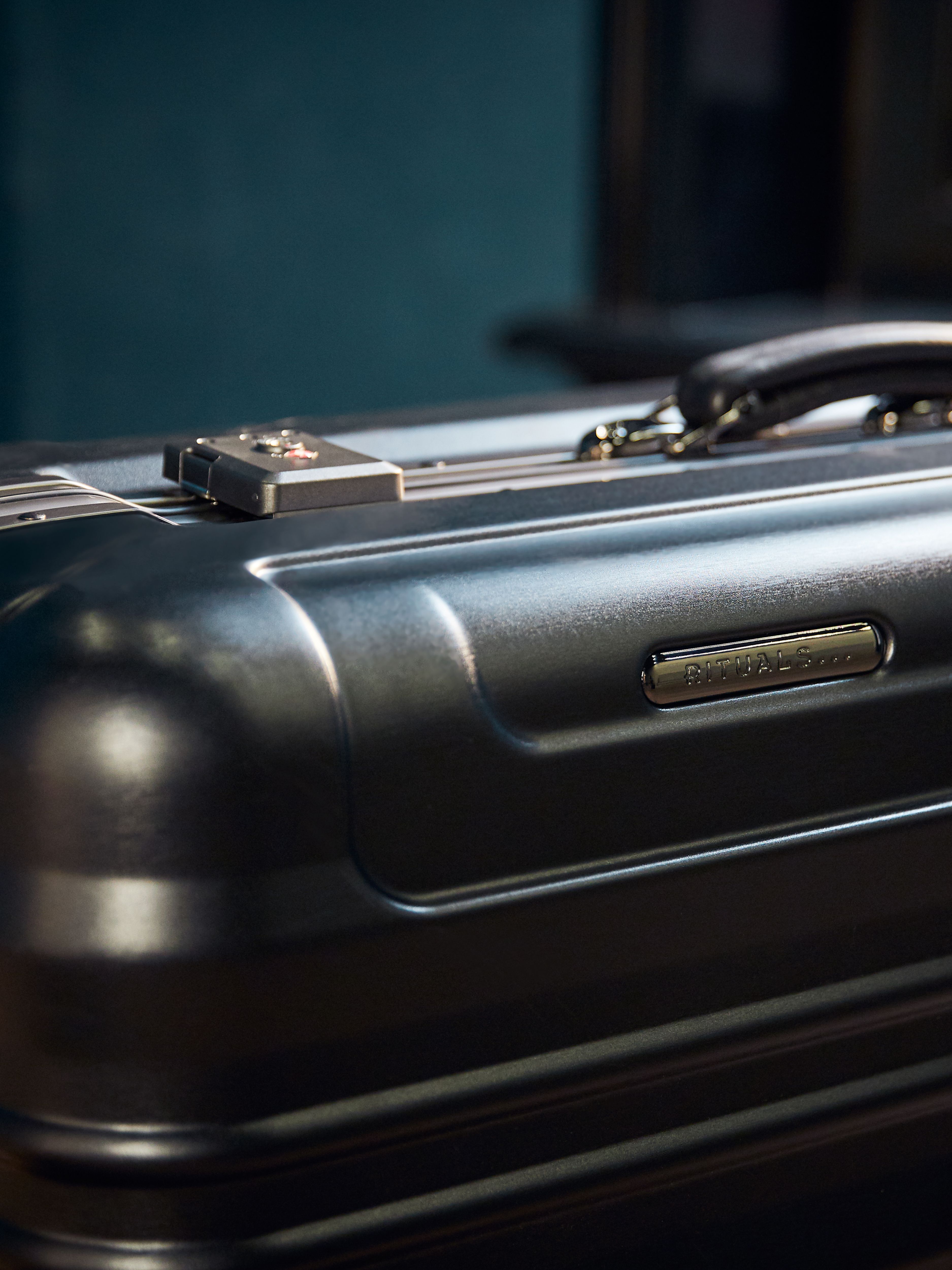 Suitcase Black M Lifestyle with Product