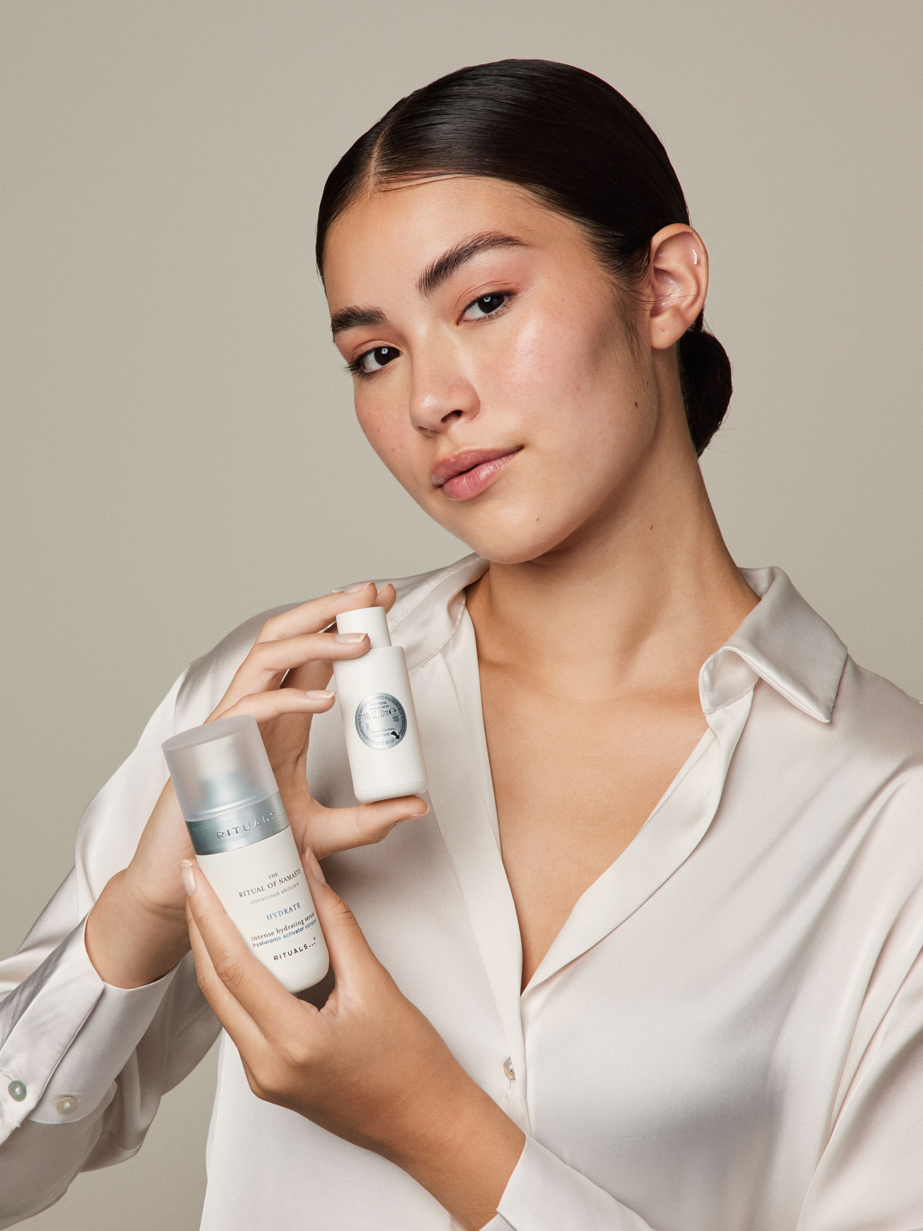 The Ritual of Namaste Intense Hydrating Serum Refill Studio with Model and Product