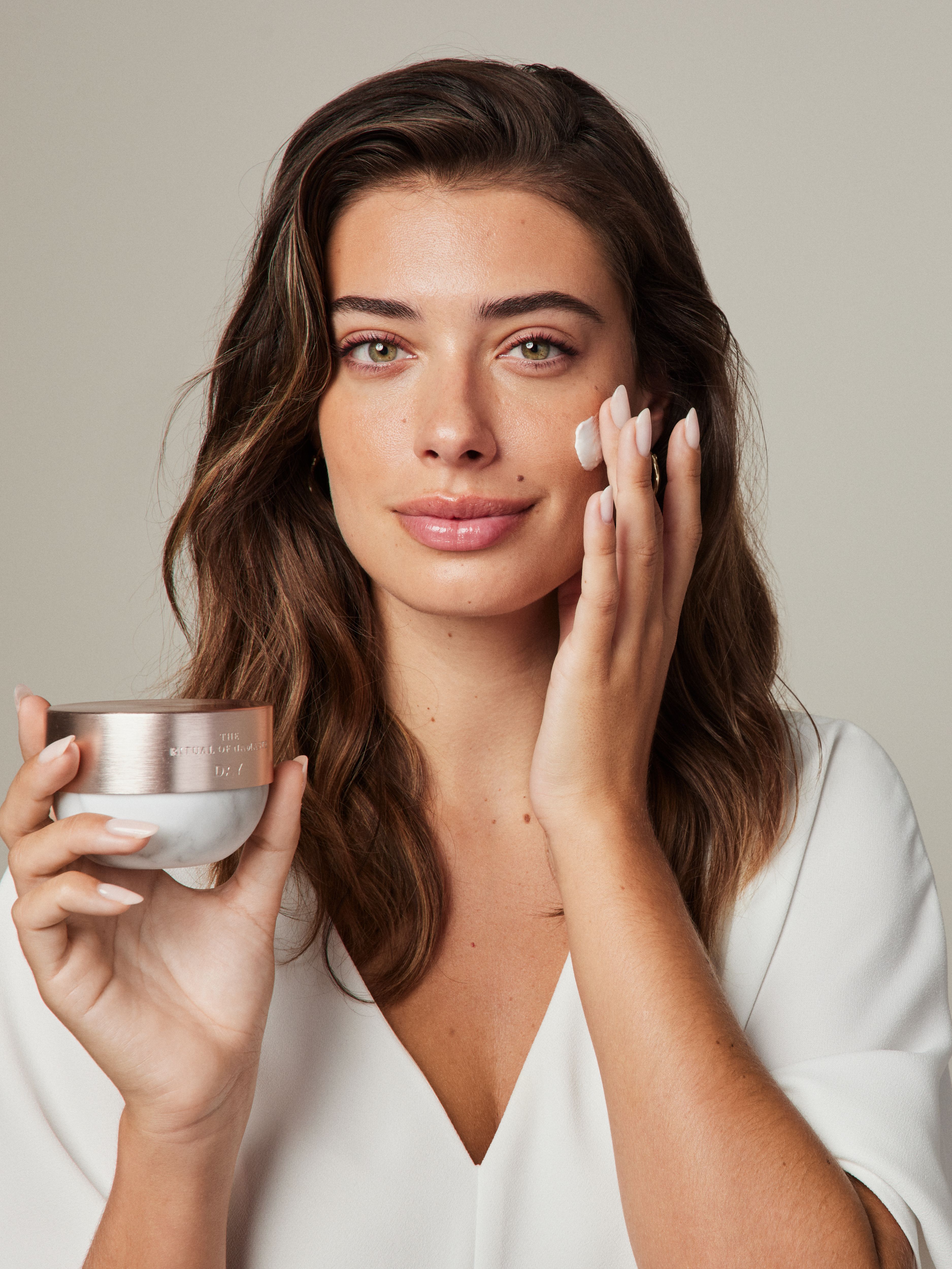 The Ritual of Namaste Glow Anti-Ageing Day Cream Studio with Model and Product