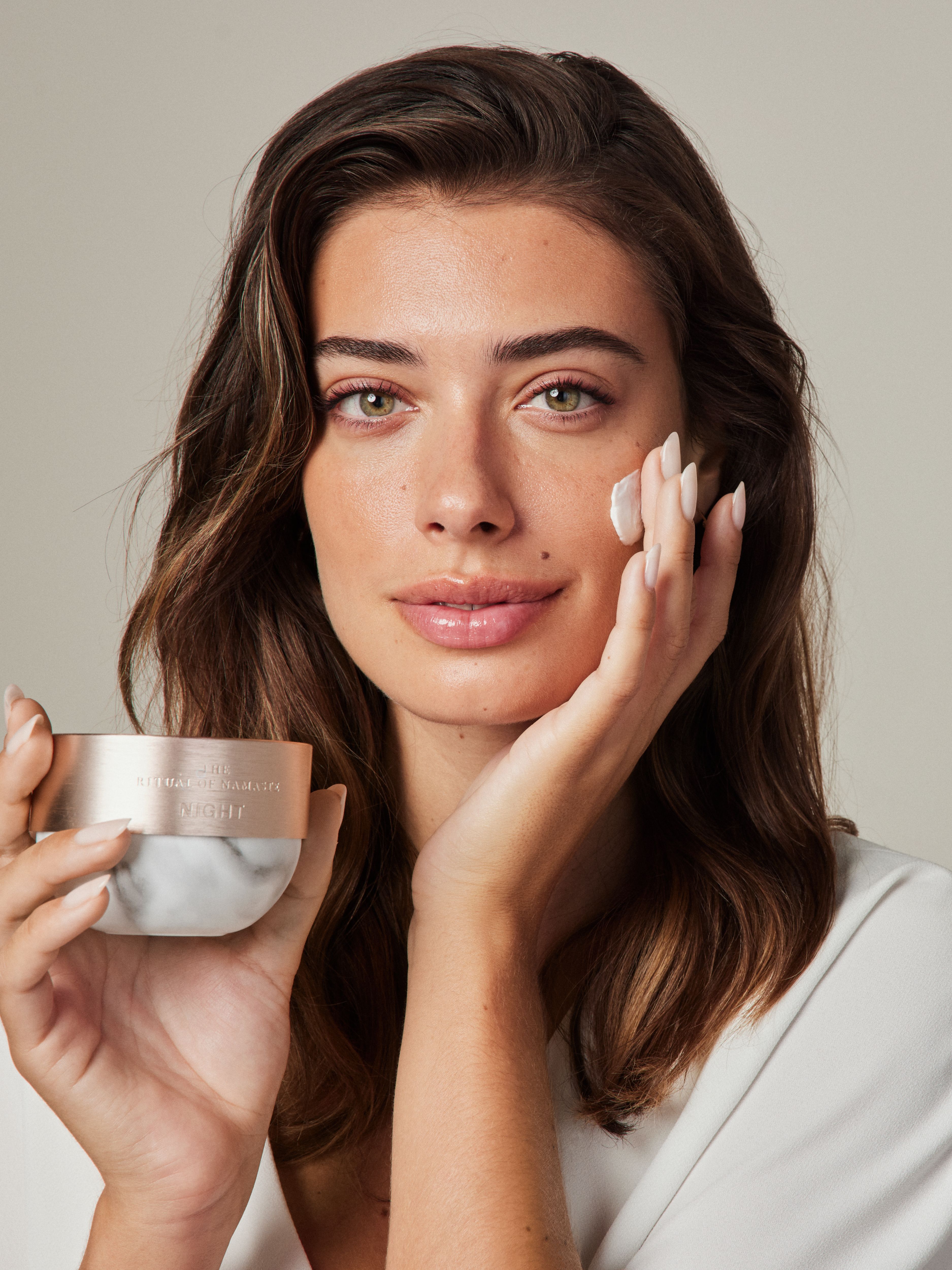 The Ritual of Namaste Glow Anti-Ageing Night Cream Studio with Model and Product