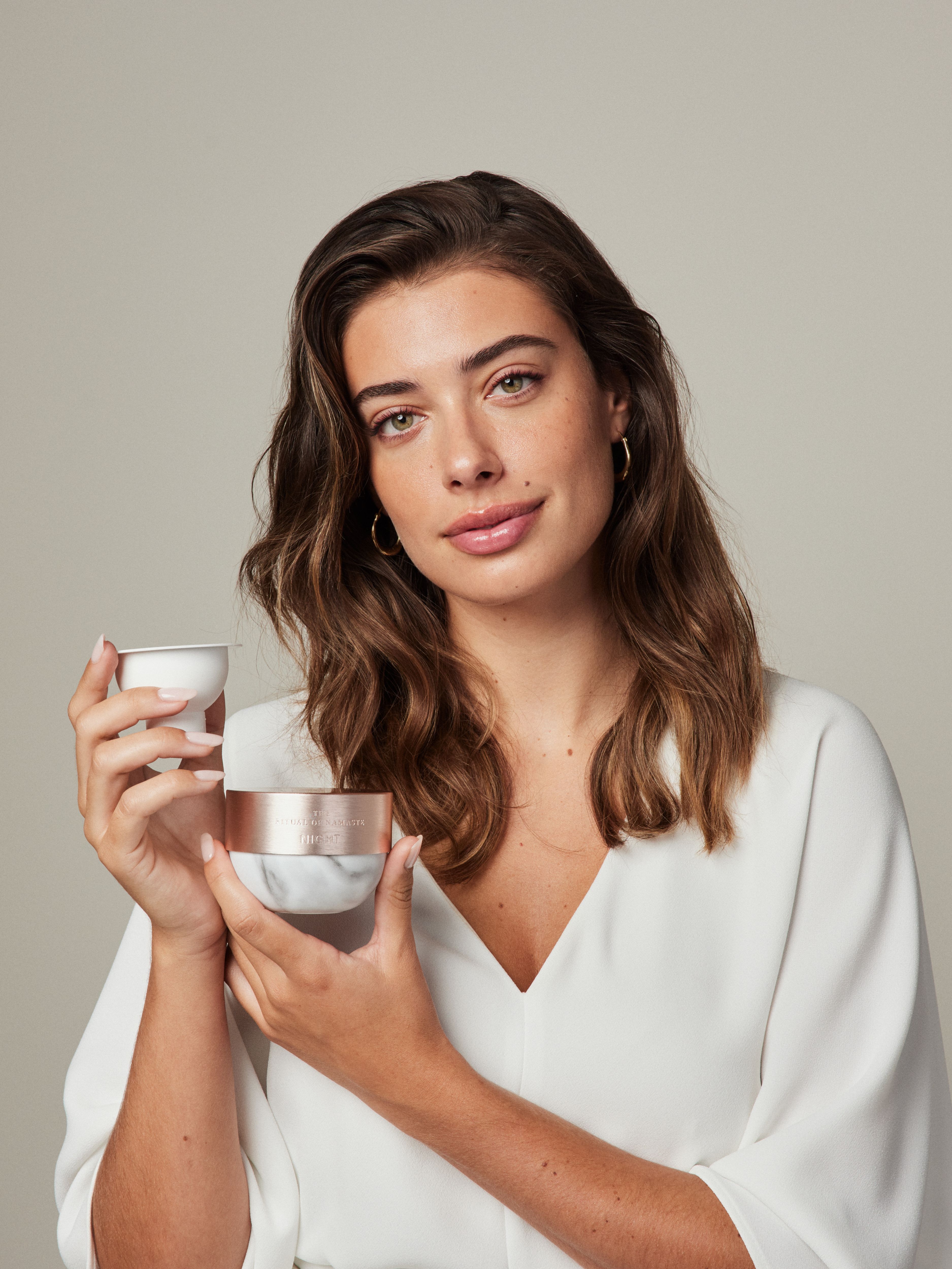 The Ritual of Namaste Glow Anti-Ageing Night Cream Refill Studio with Model and Product