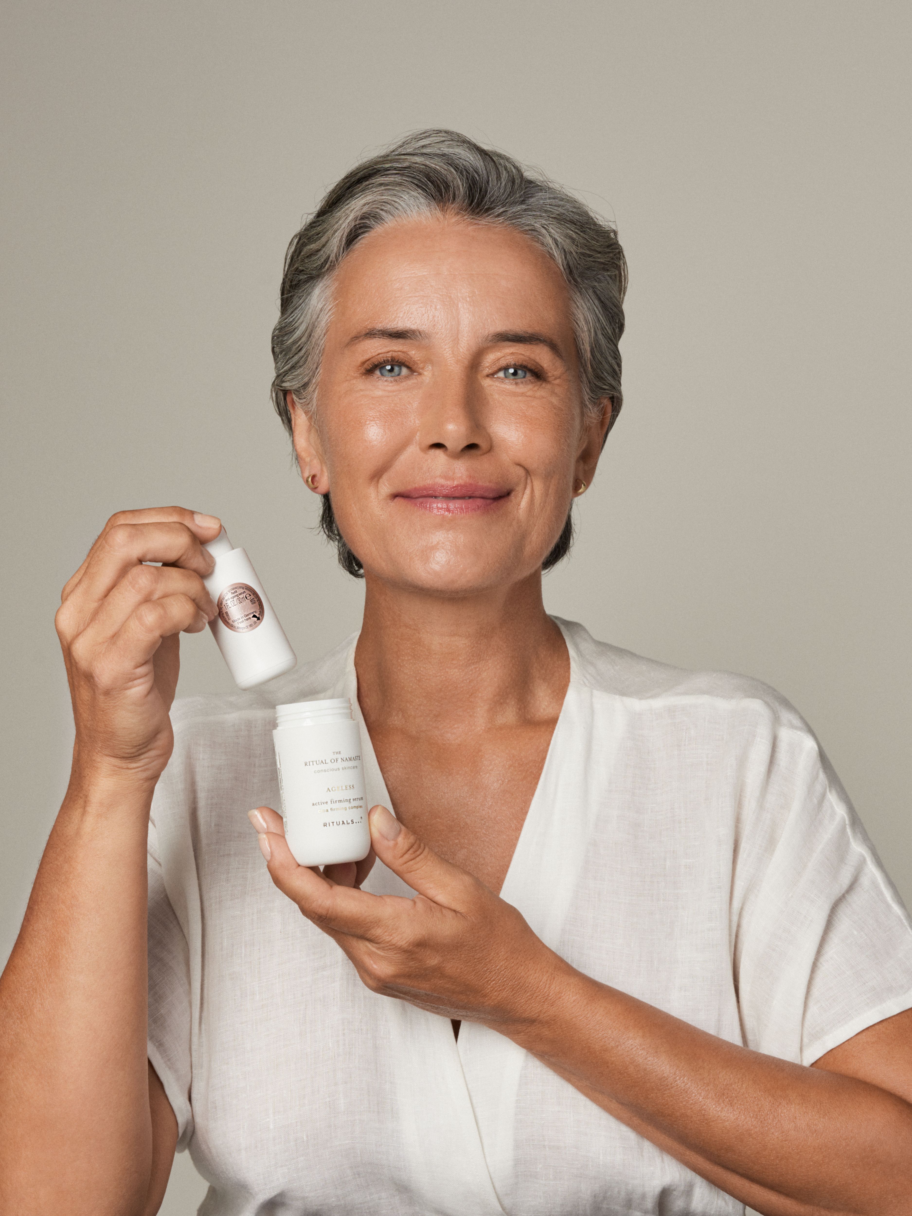 The Ritual of Namaste Ageless Firming Serum Studio with Model and Product