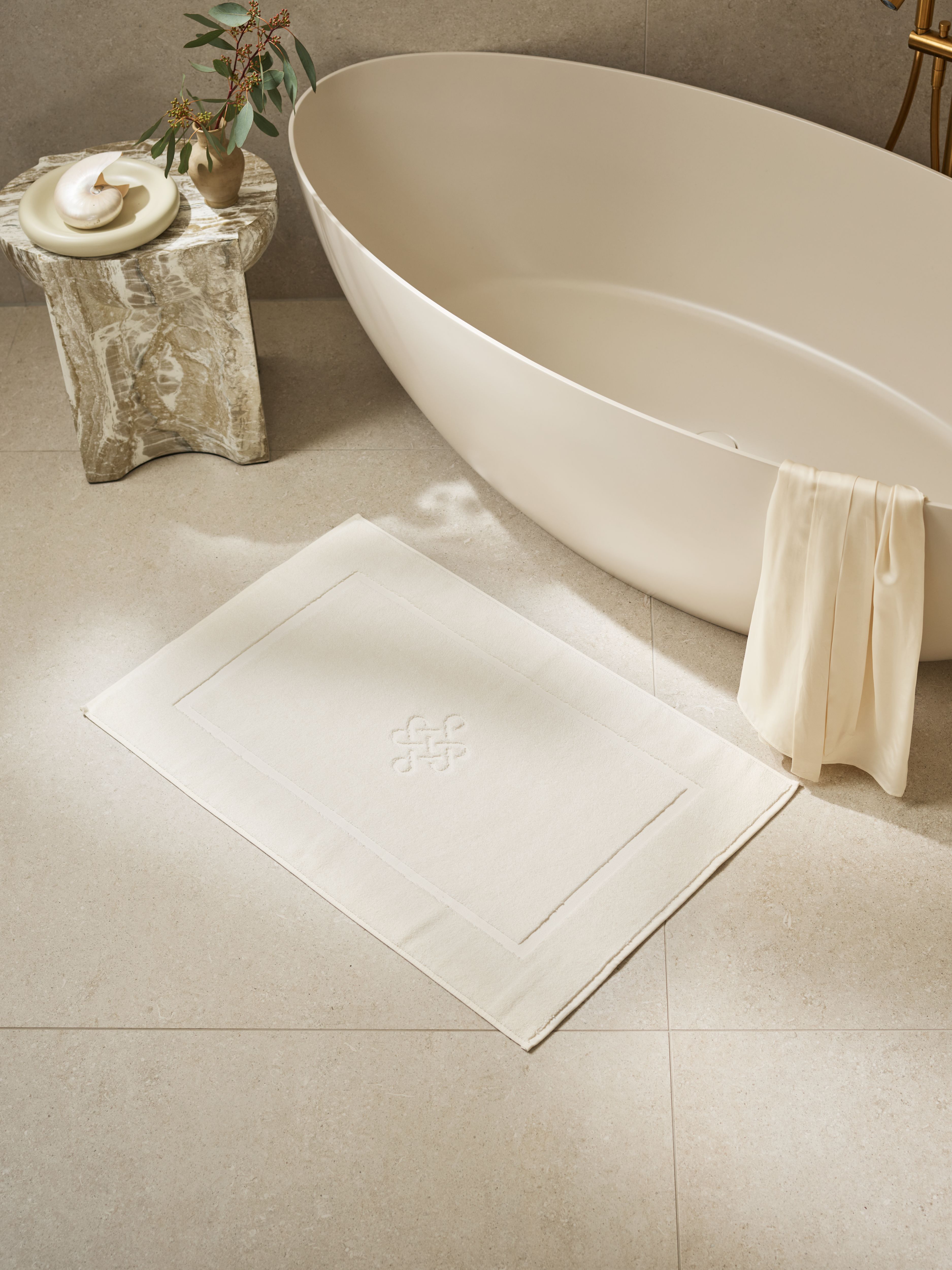 Super Smooth Cotton Bath Mat 60x90cm Off White Lifestyle with Product