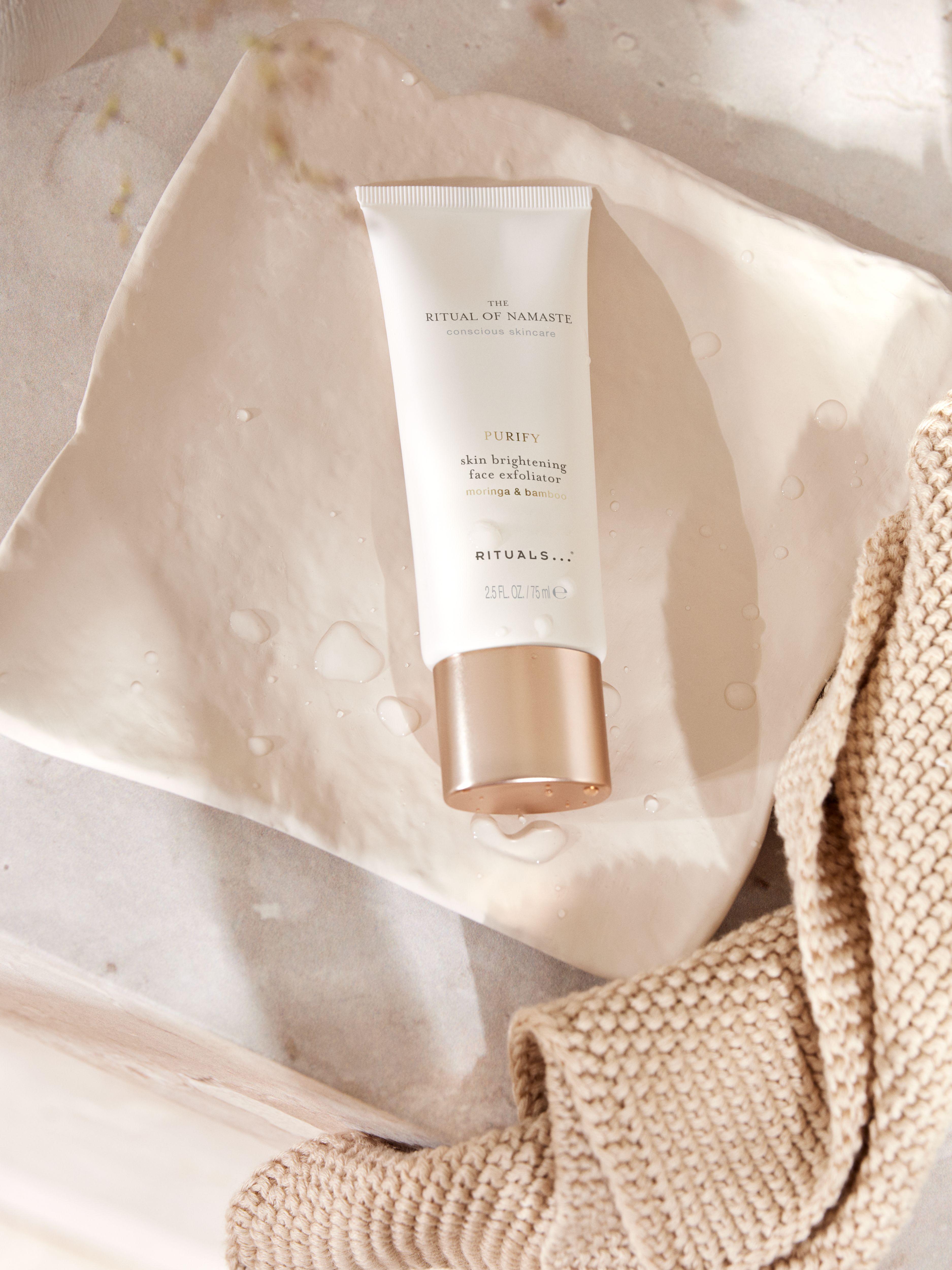 The Ritual of Namaste Face Exfoliator Lifestyle with Product