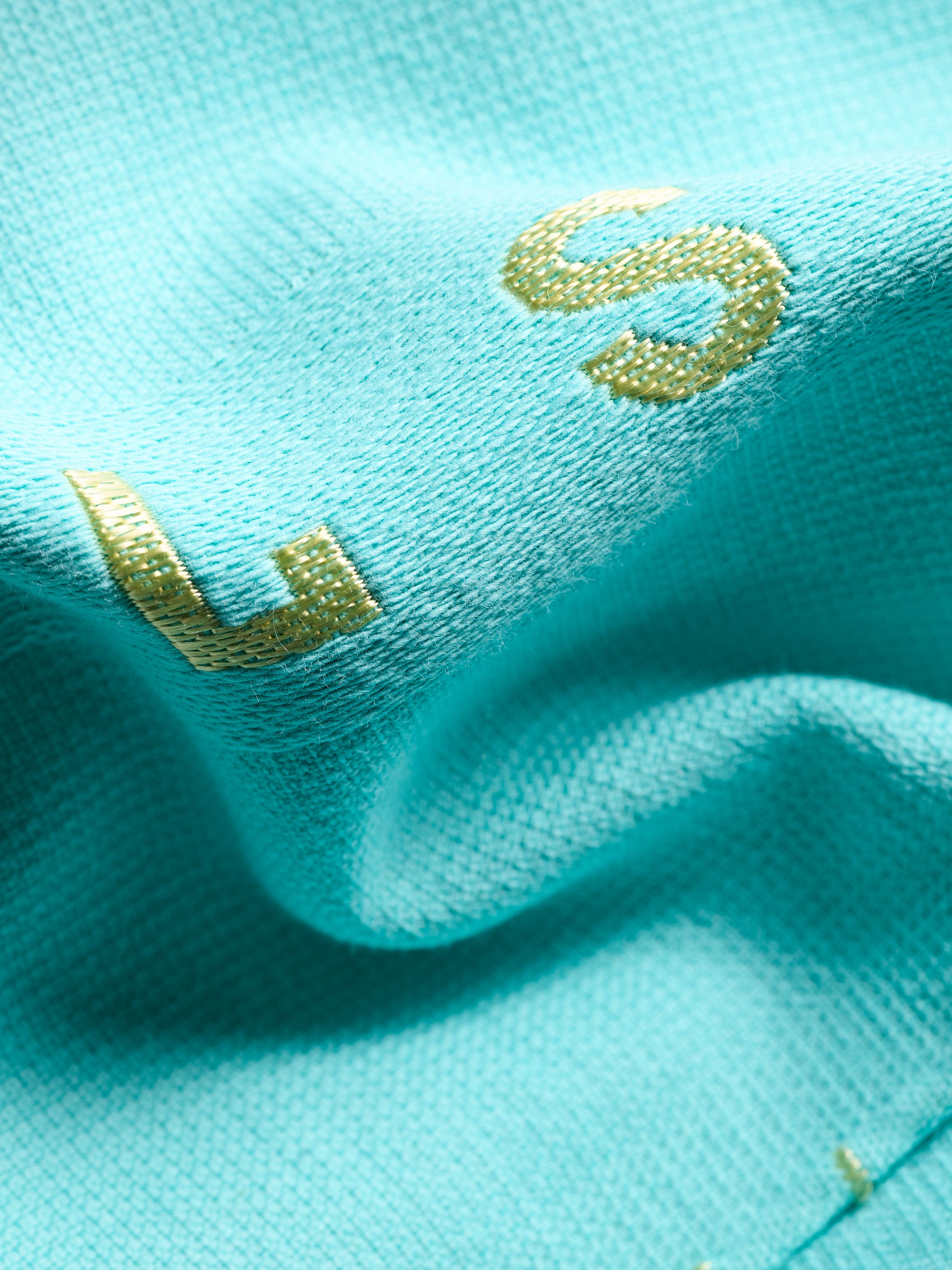 Hammam Towel Karma Turquoise Lifestyle with Product Elements