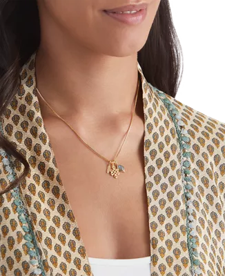 gold plated necklace with gemstone