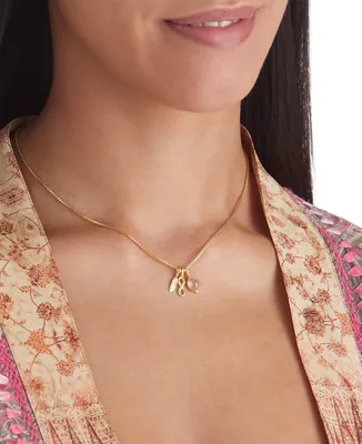 gold plated necklace with gemstone