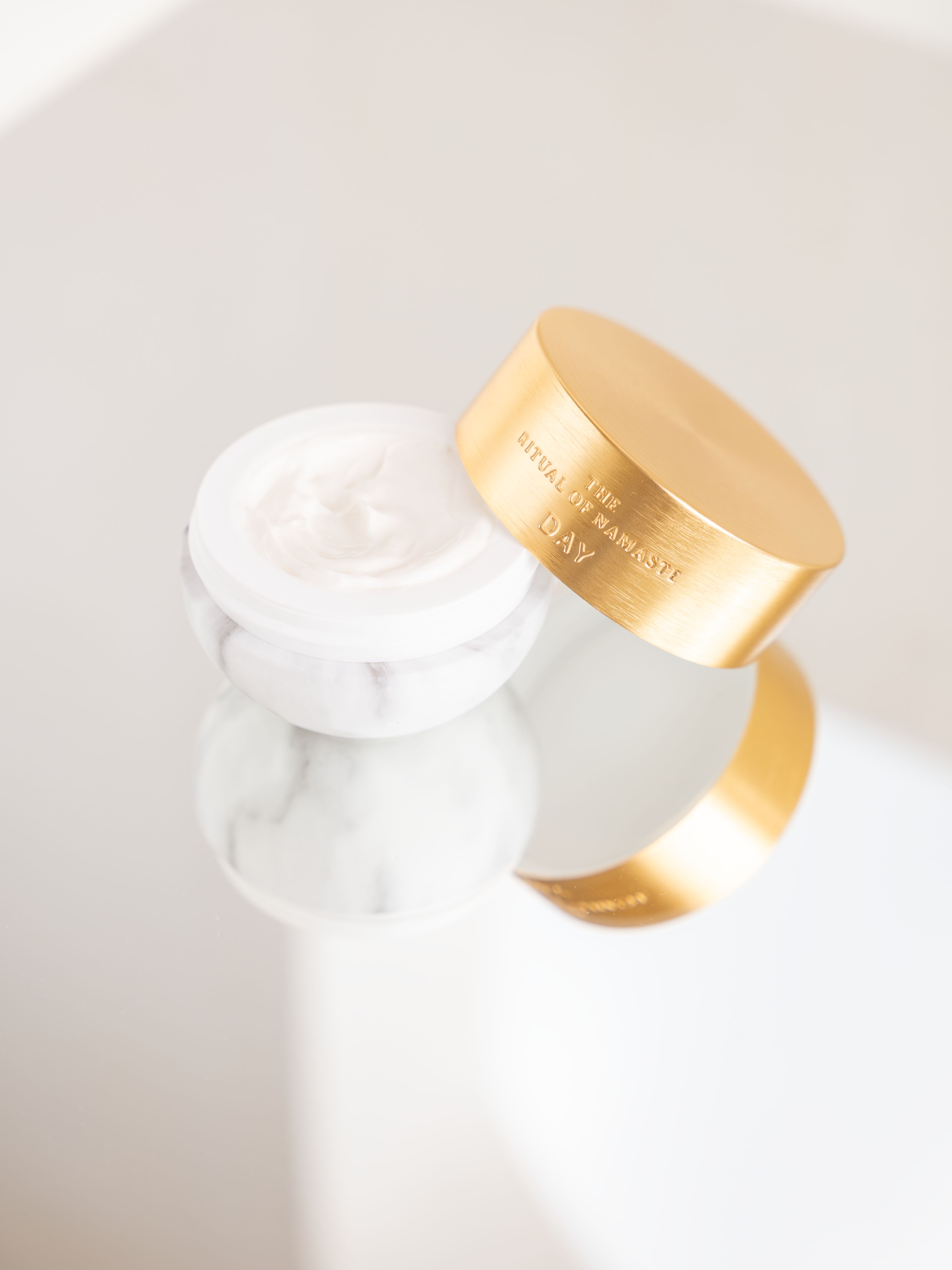 The Ritual of Namaste Ageless Firming Day Cream Lifestyle with Product