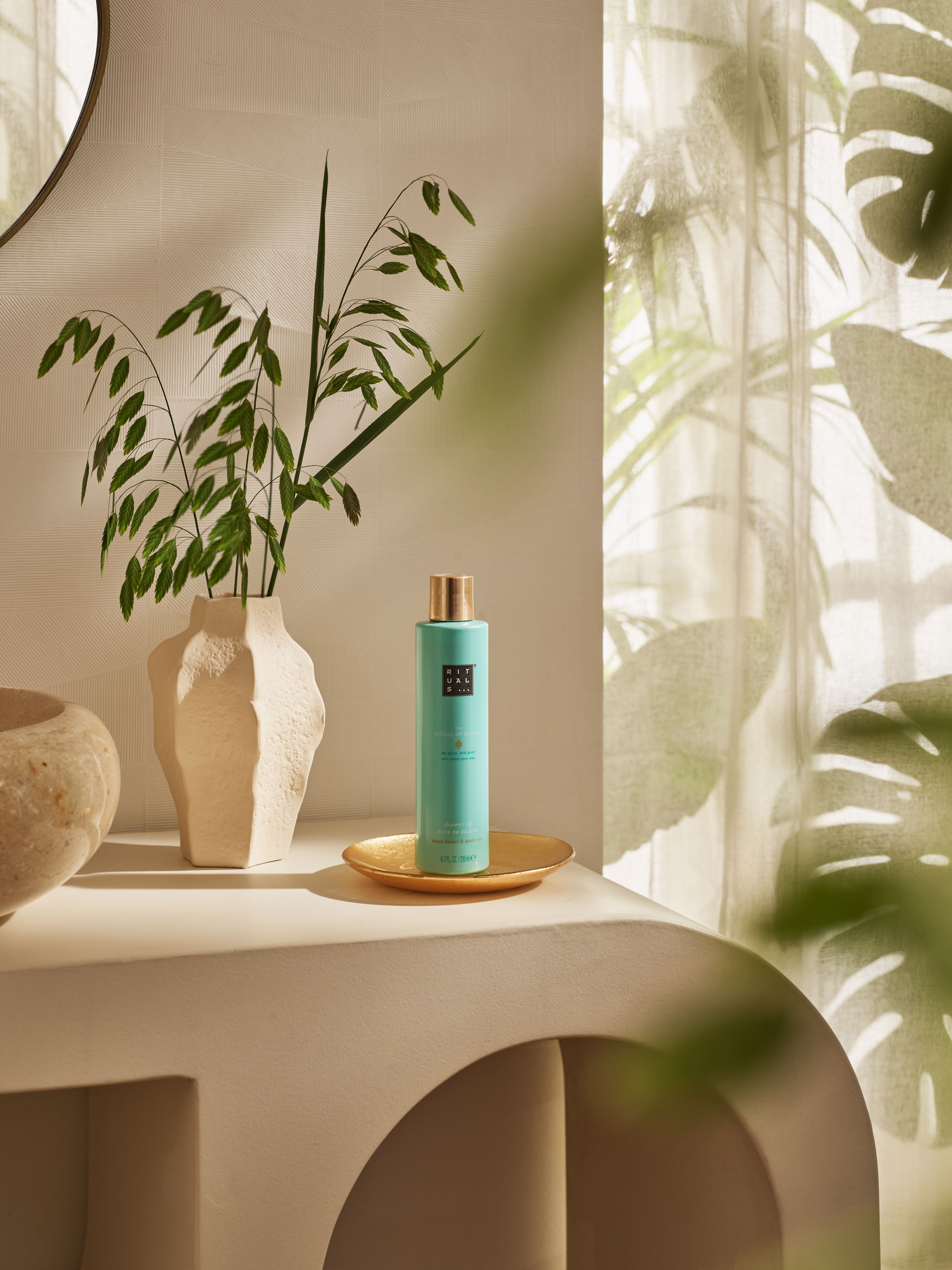 The Ritual of Karma Shower Oil 200ml Lifestyle with Product