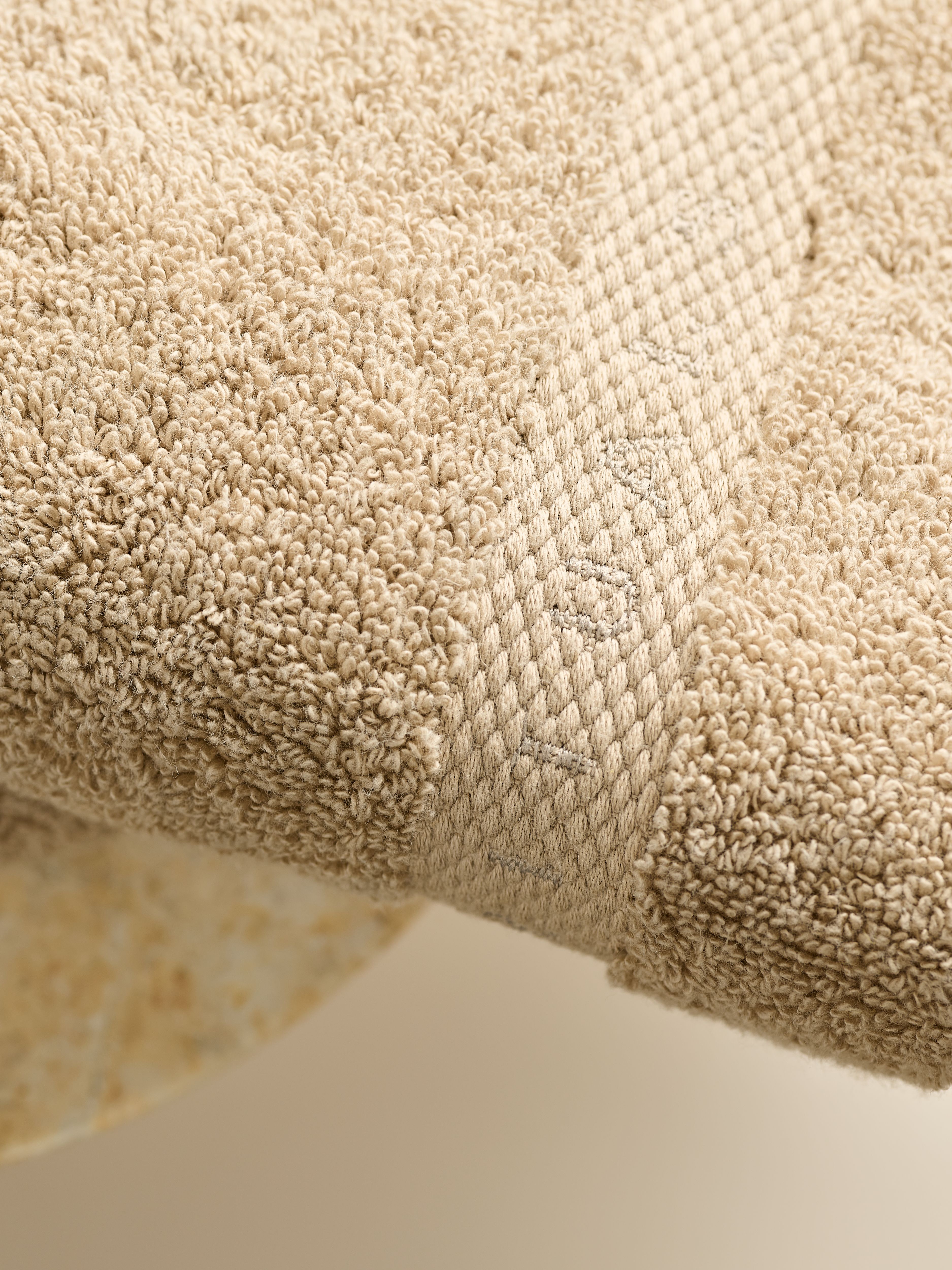 Super Smooth Cotton Guest Towel 30x30cm Sand Lifestyle with Product Elements