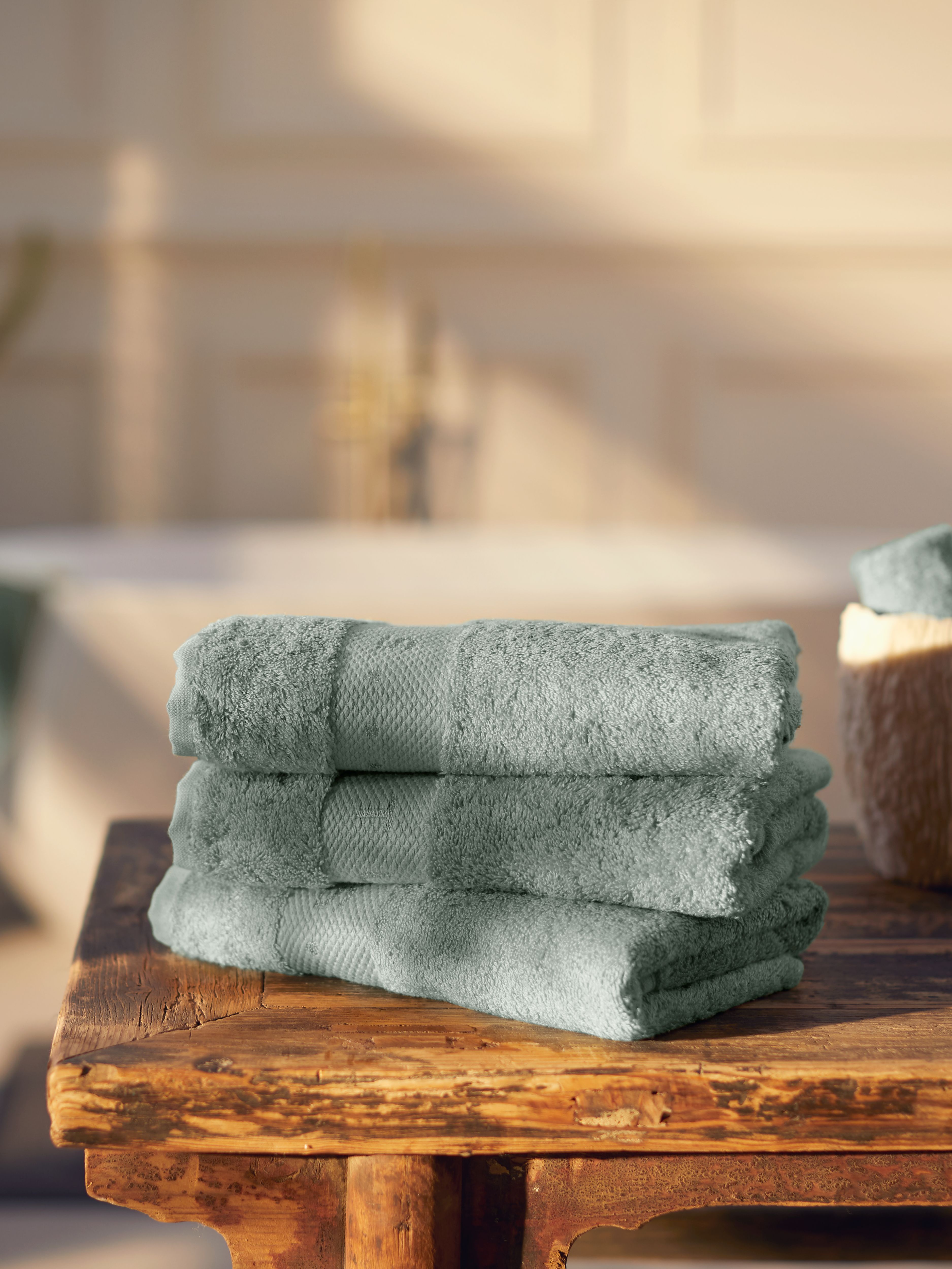 Super Smooth Cotton Hand Towel 50x100cm Misty Jade Lifestyle with Product