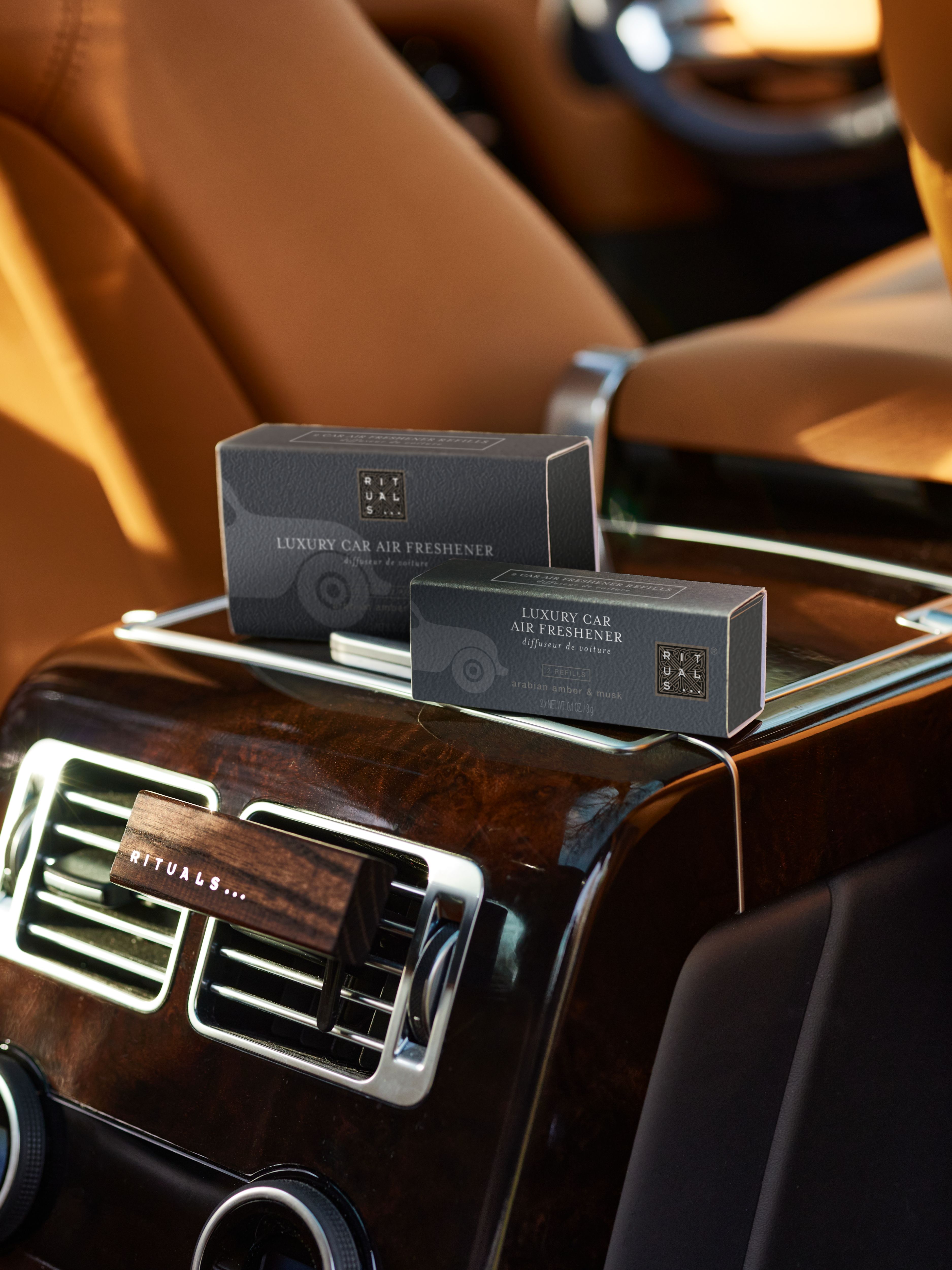 Homme Refill Car Air Freshener Lifestyle with Product