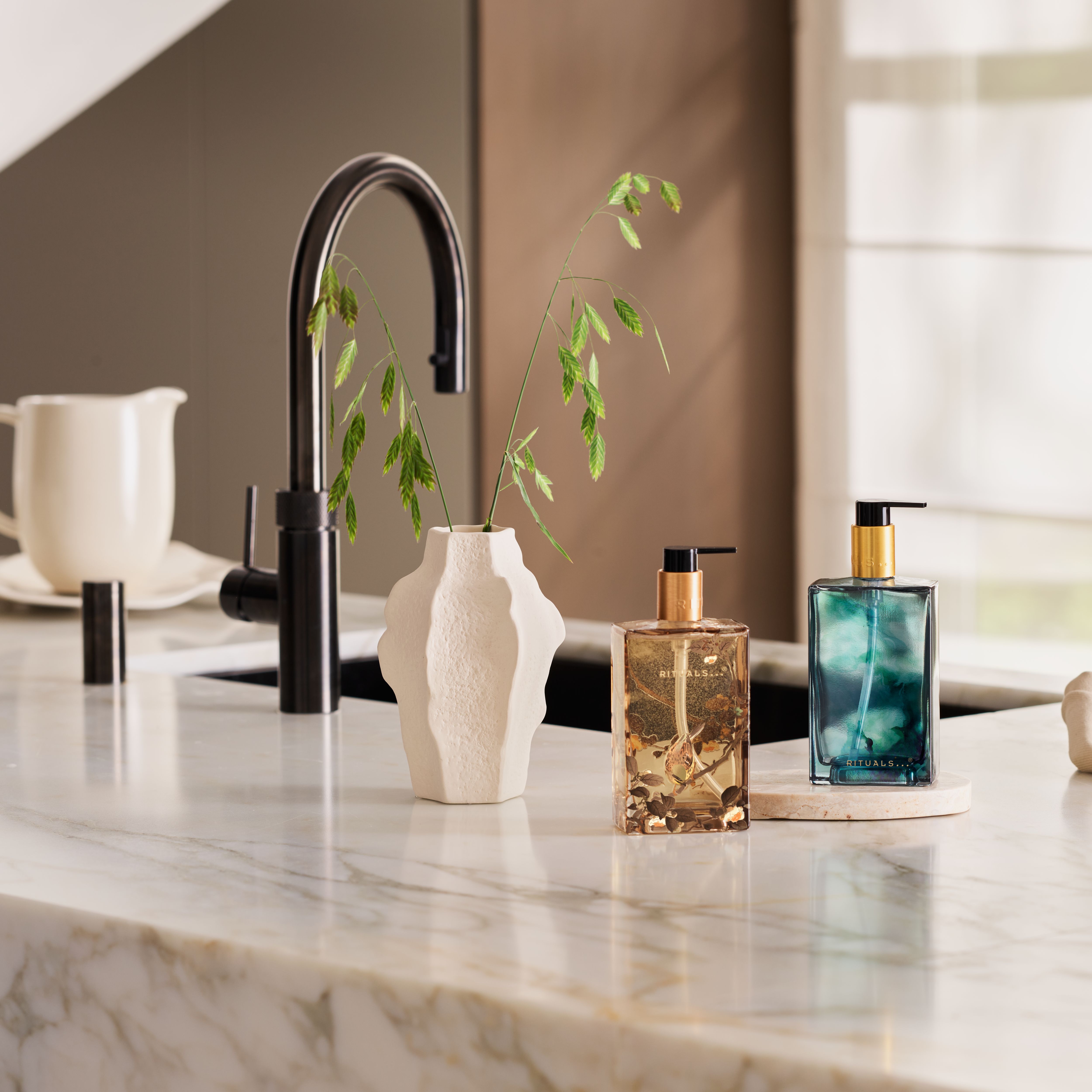  Refillable Hand Wash - Blue Water bottle Lifestyle with Product Range