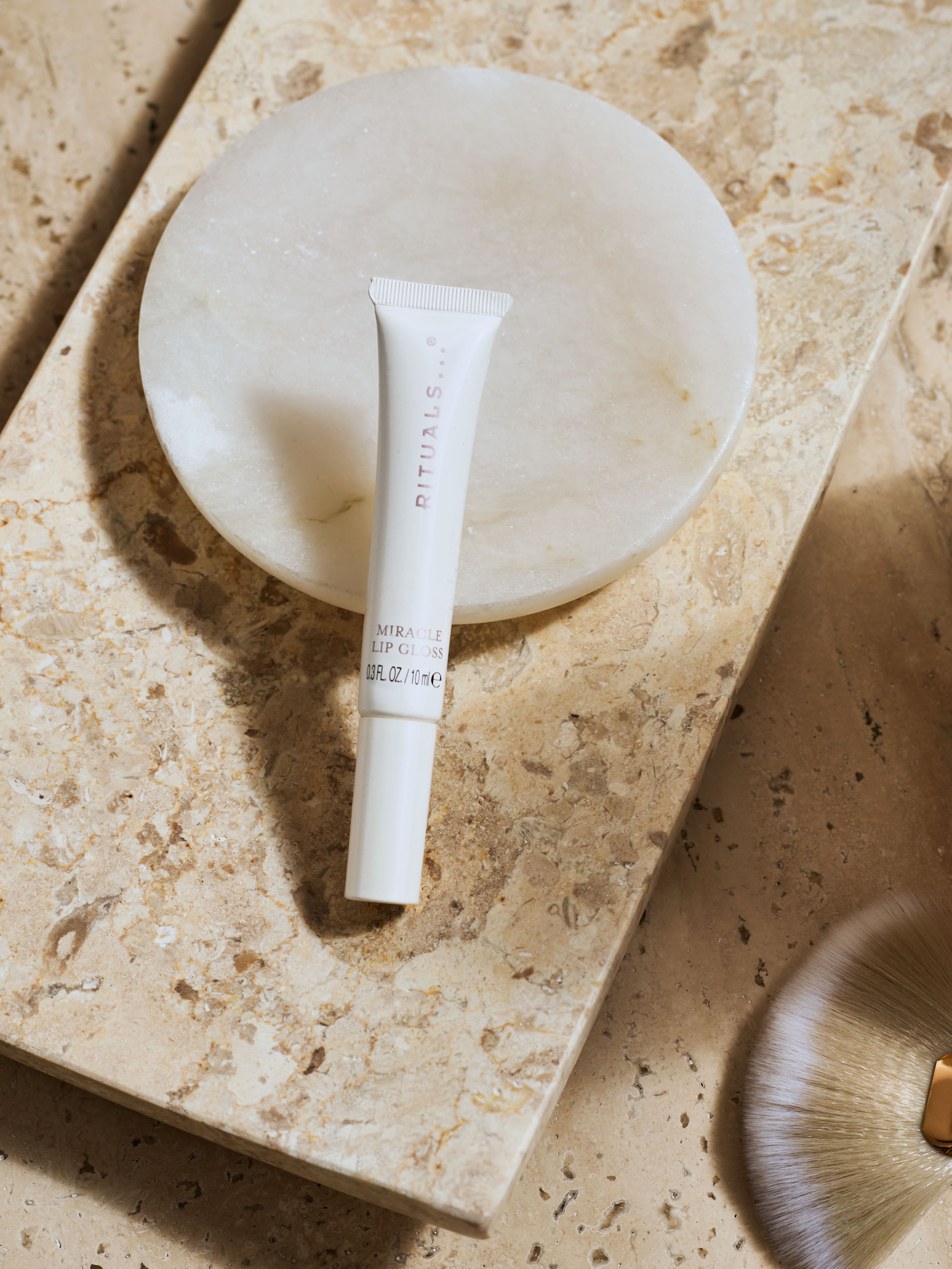 Miracle Lip Gloss - Clear Intentions Lifestyle with Product