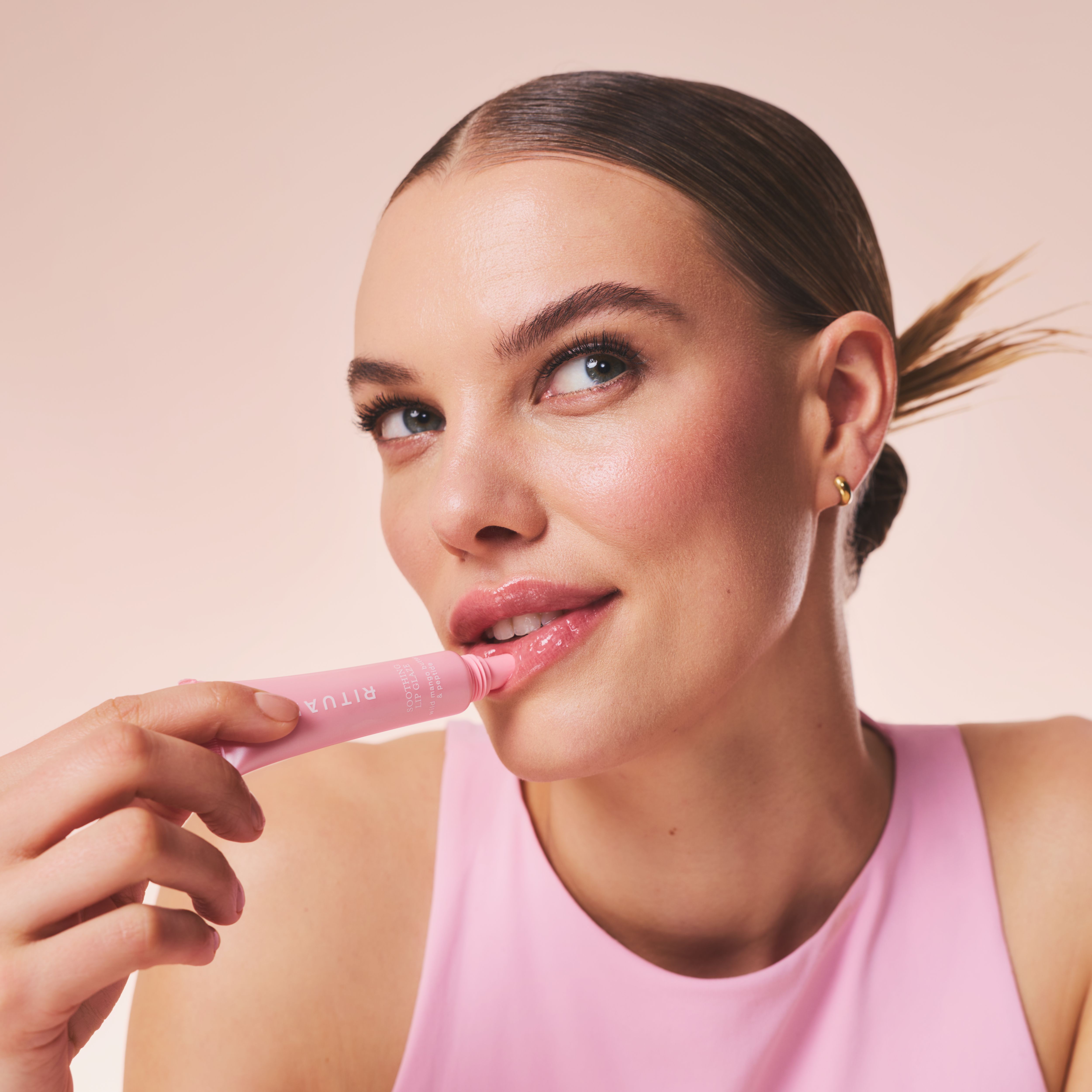 Soothing Lip Glaze - Twirl Lifestyle with Model and Packshot