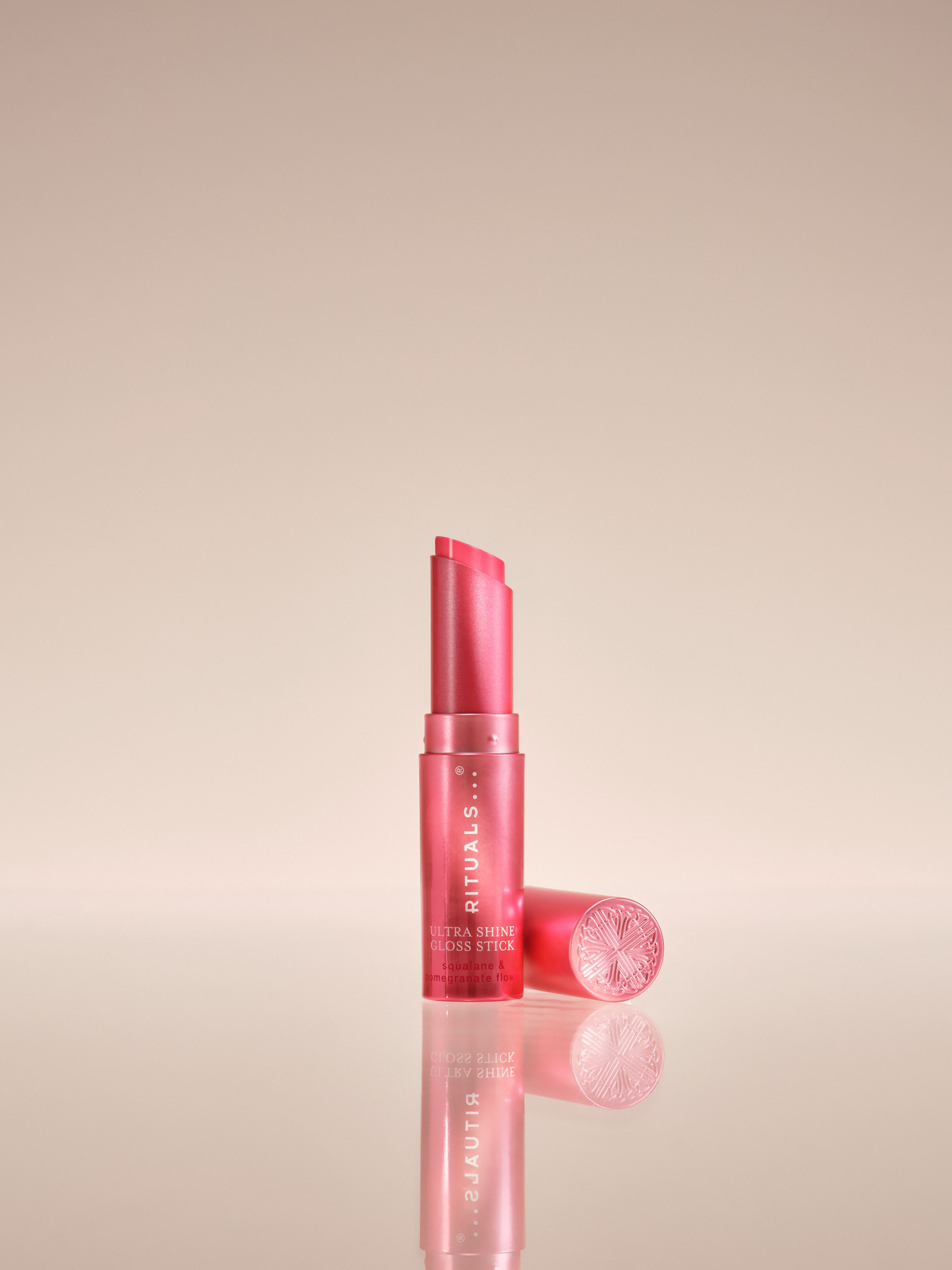Ultra Shine Gloss Stick - Cheeky Studio with Product