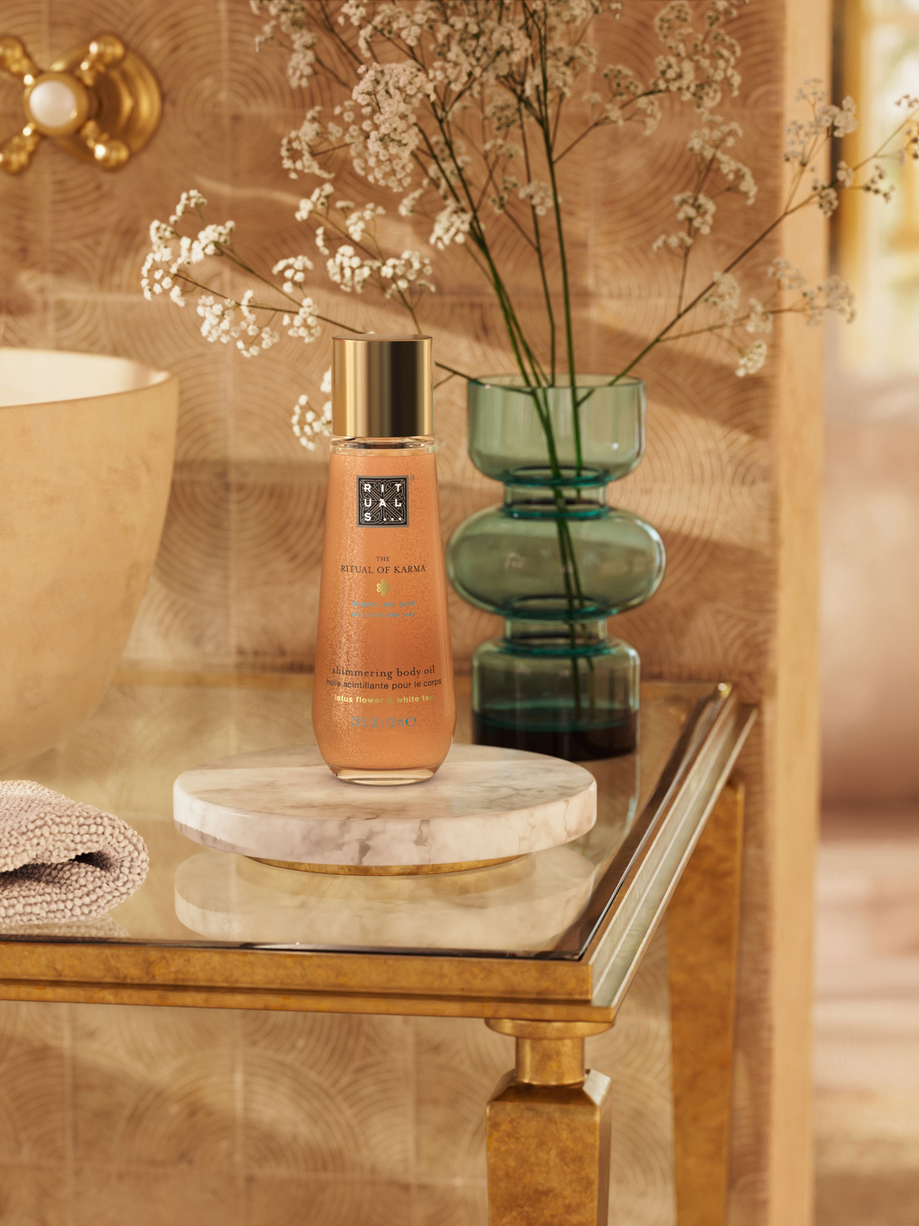 The Ritual of Karma Shimmering Body Oil 100ml Lifestyle with Product
