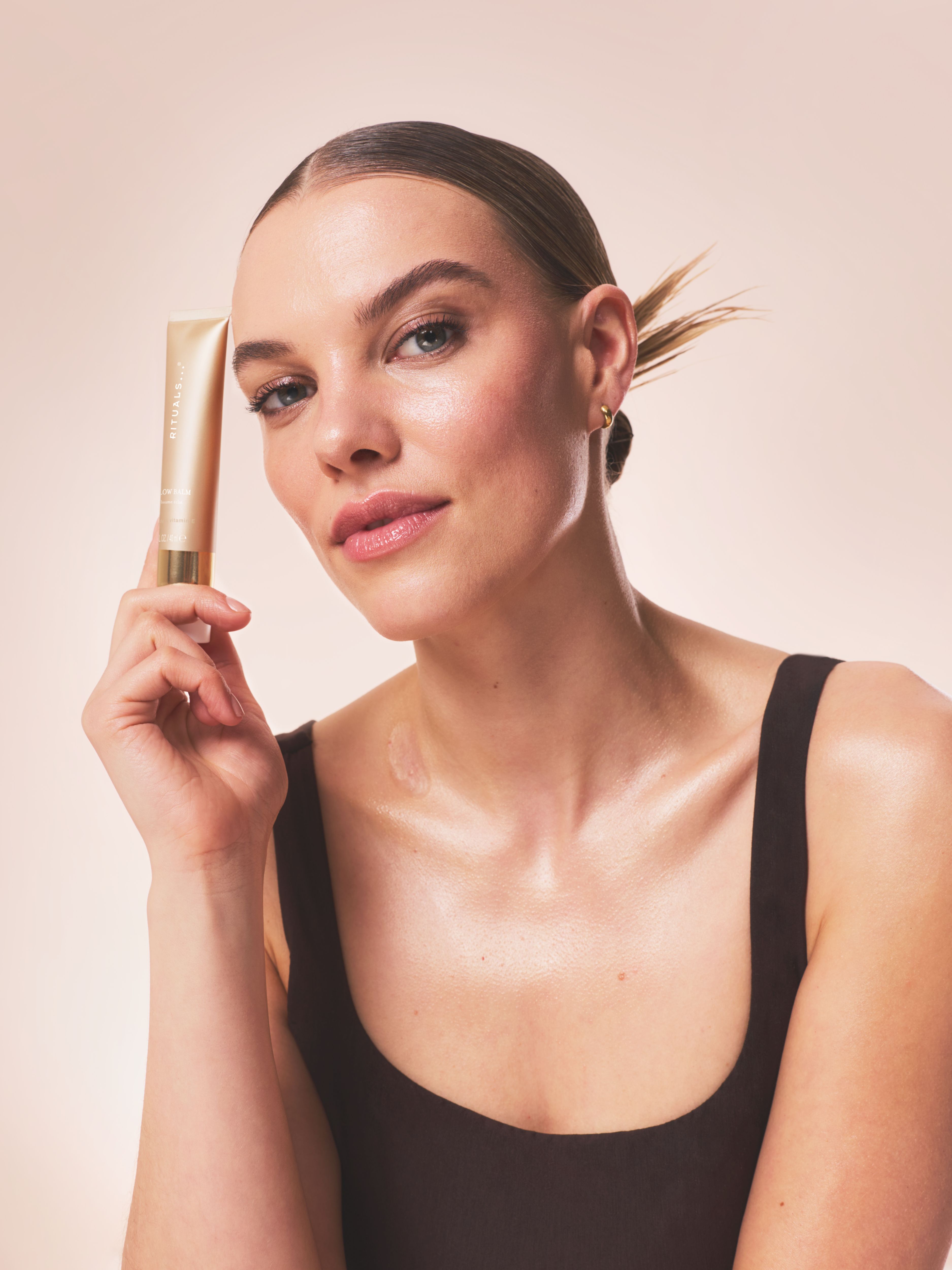 Glow Balm 40ml Lifestyle with Model and Packshot