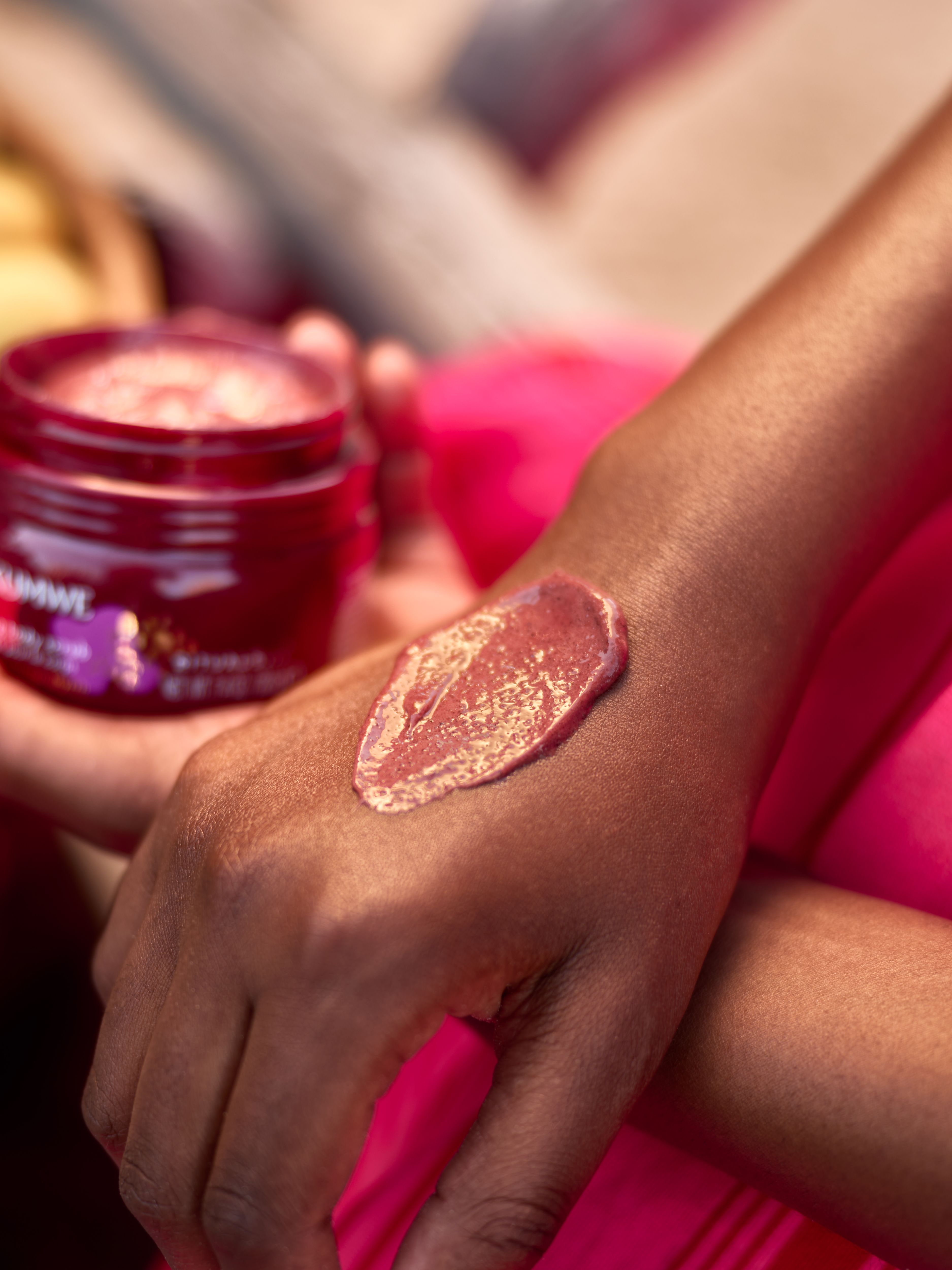 Uukumwe Collection Warming Body Scrub 220g Lifestyle with Model