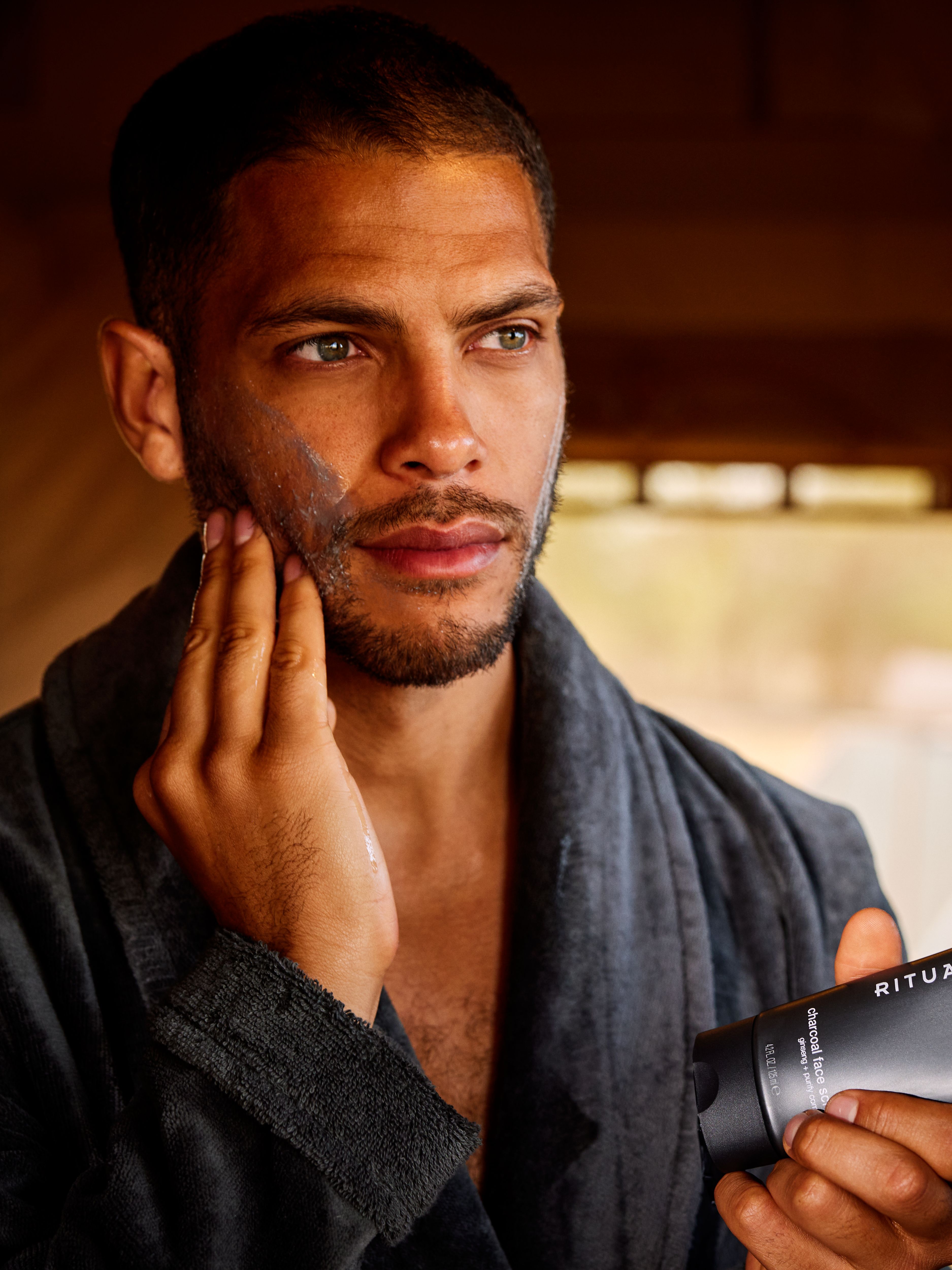 Homme Charcoal Face Scrub Lifestyle with Model and Packshot